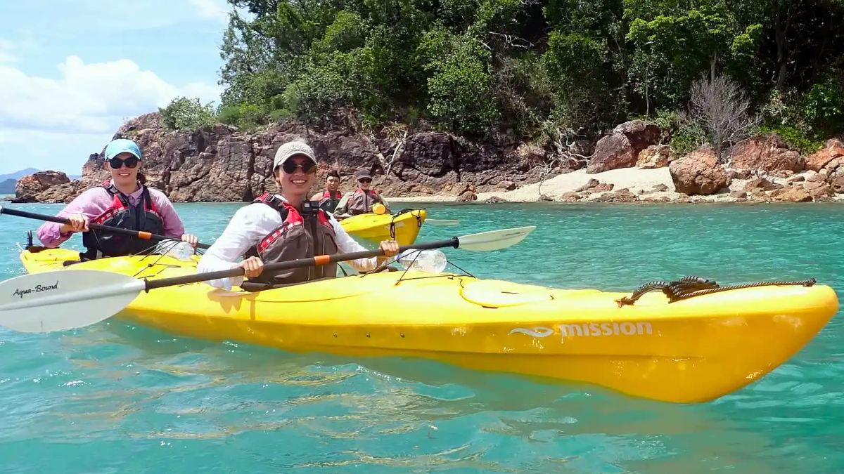 Two people in a kayak exploring the Whitsundays